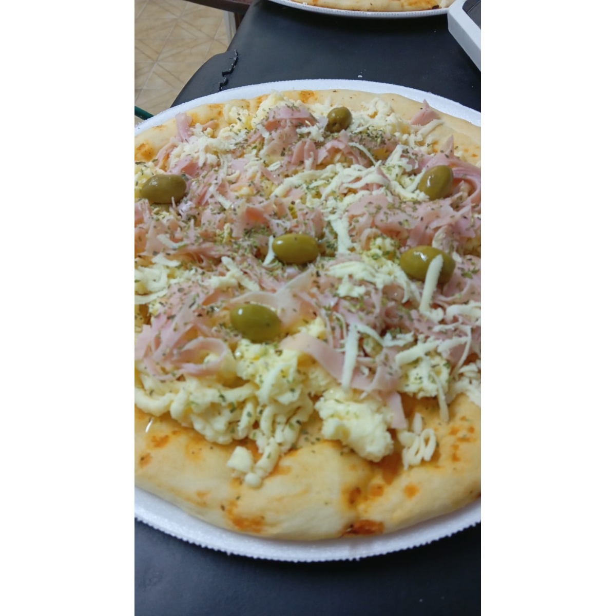 PIZZA PREHORNEADA MUZZA