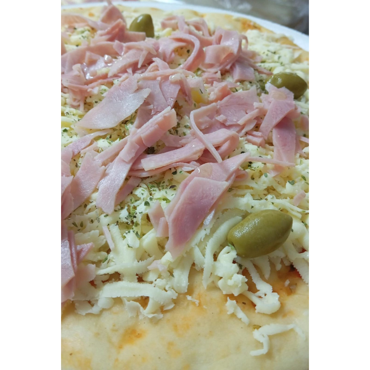 PIZZA PREHORNEADA MUZZA